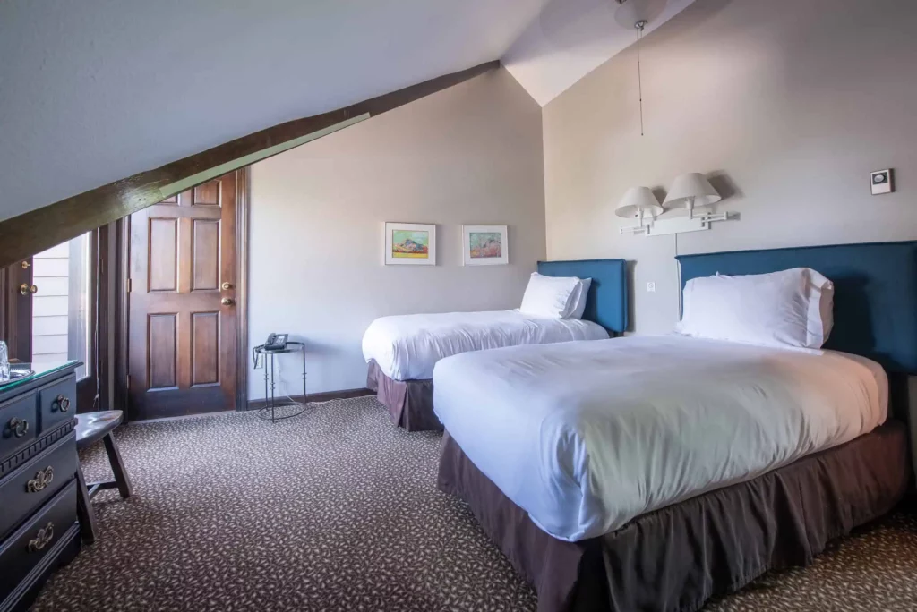 Two-bed guest room with private bath at Elk Mountain Lodge in Crested Butte, Colorado